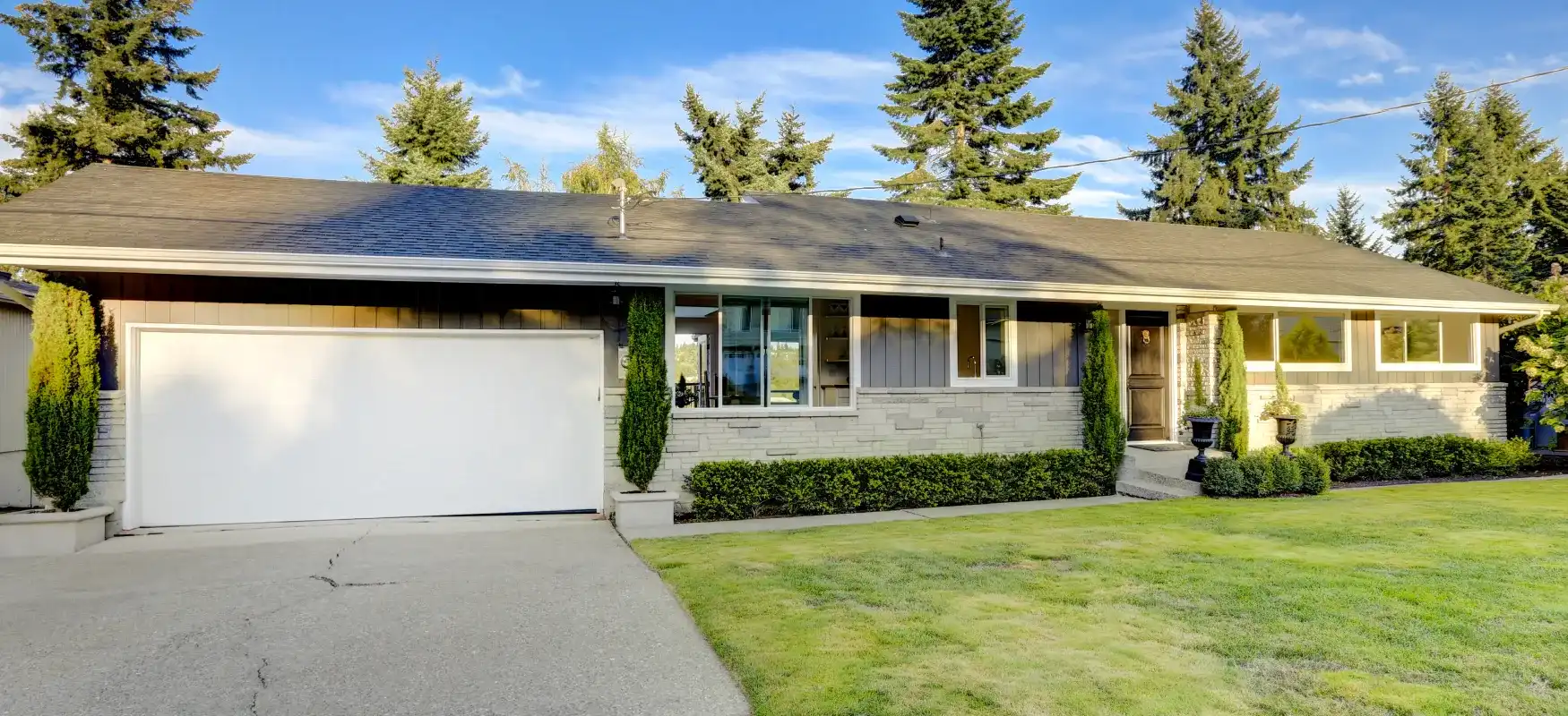 Concrete Block Ranch With Driveway Photo Compressed